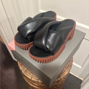 Elegant Black Leather Sandals with Brown Soles